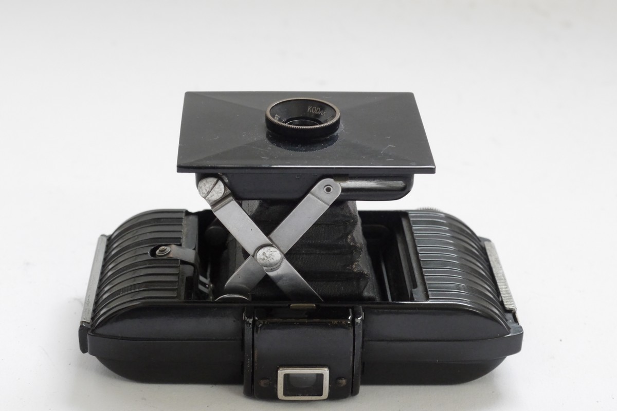 Kodak Bantam 828 Black Bakelite strut folding camera with 53mm f6 Kodak Bantam 828 Black Bakelite strut folding camera with 53mm f6.3 Anastigmat lens