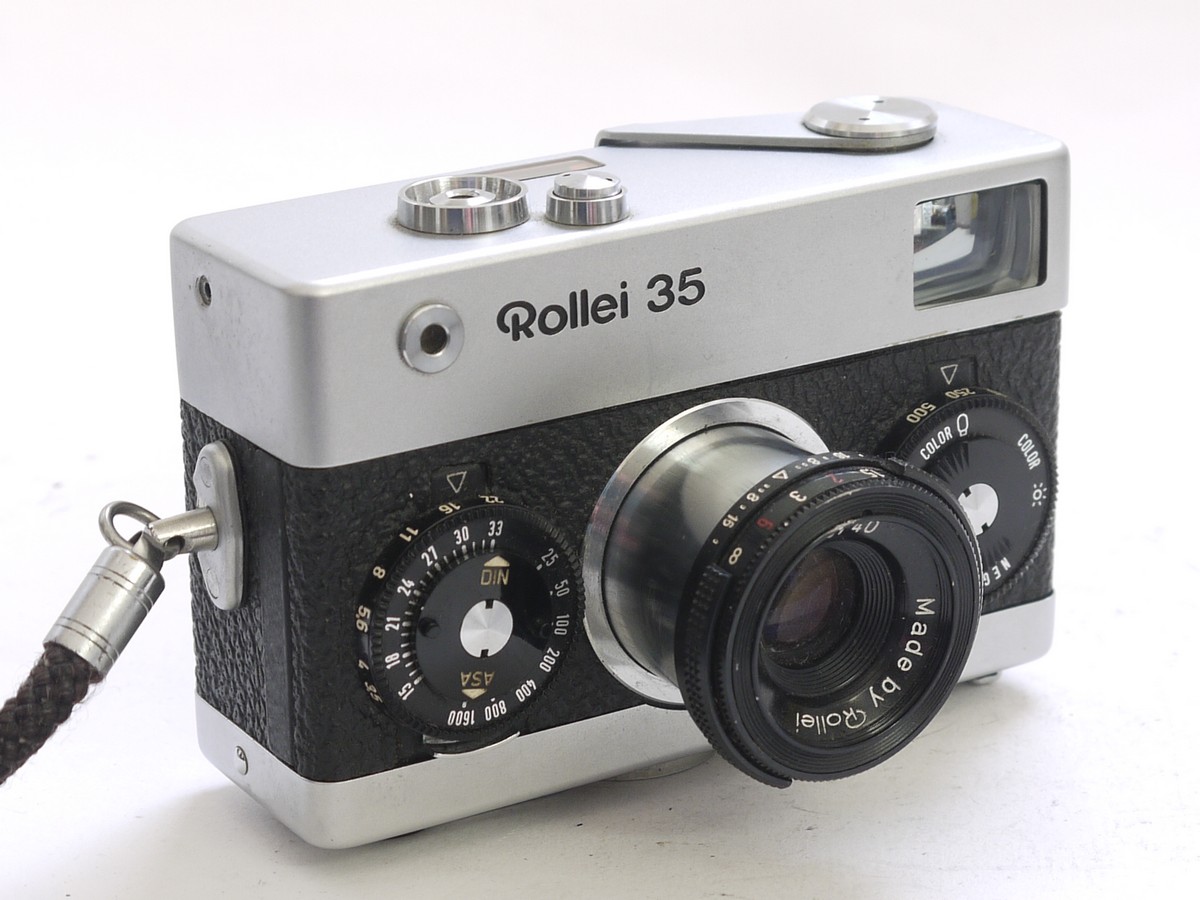 Rollei 35 chrome CDS metered compact camera, chrome, with 40mm f3 Rollei 35 chrome CDS metered compact camera, chrome, with 40mm f3.5 Tessar + makers wrist strap & pouch case