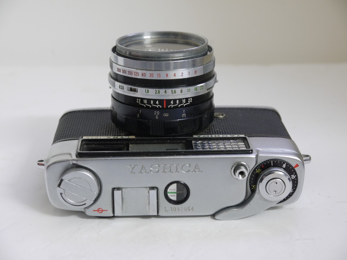 Yashica Lynx 1000L 35mm selenium metered coupled rangefinder camera with 4.5cm f1 Yashica Lynx 1000L 35mm selenium metered coupled rangefinder camera with 4.5cm f1.8 Yashinon lens, Yashica UV filter, front cap, ER case, original instructions & makers box with outer sleeve
