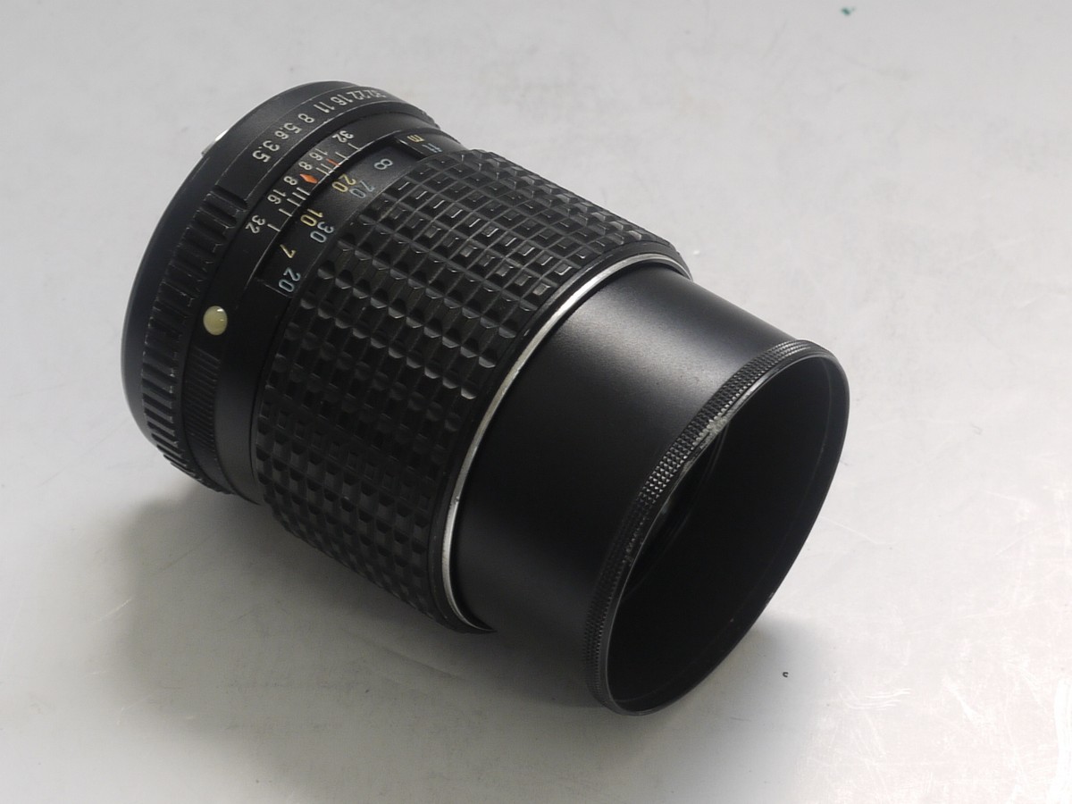 Pentax 135mm f3 Pentax 135mm f3.5 SMC Pentax-M manual focus lens with built-in lens hood + rear cap