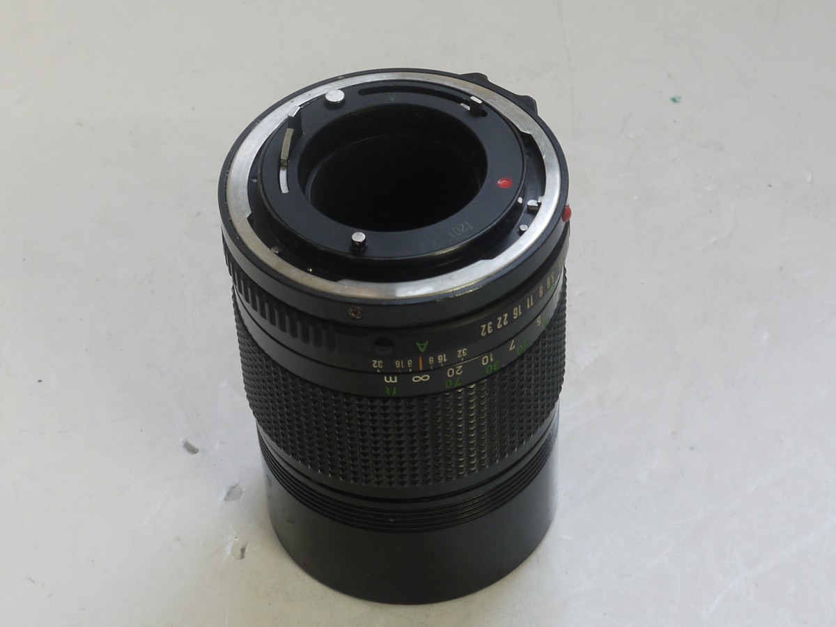 Canon 135mm f3 Canon 135mm f3.5 manual focus FD mount lens with built-in lens hood