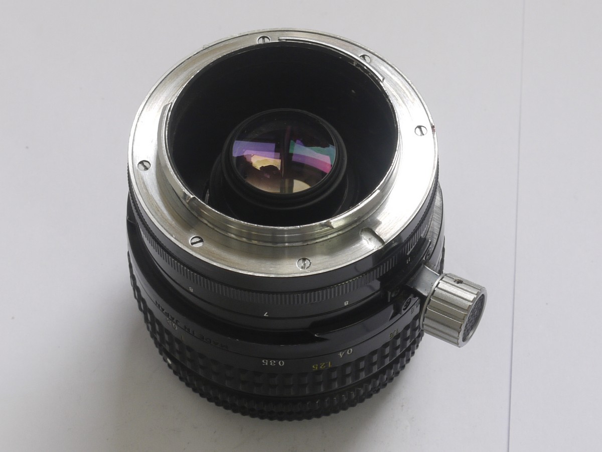 mwclassiccameras-20210409-197 Nikon 35mm f2.8 PC-Nikkor shift lens adapted into A Leica R mount + screw-in lens hood & makers caps