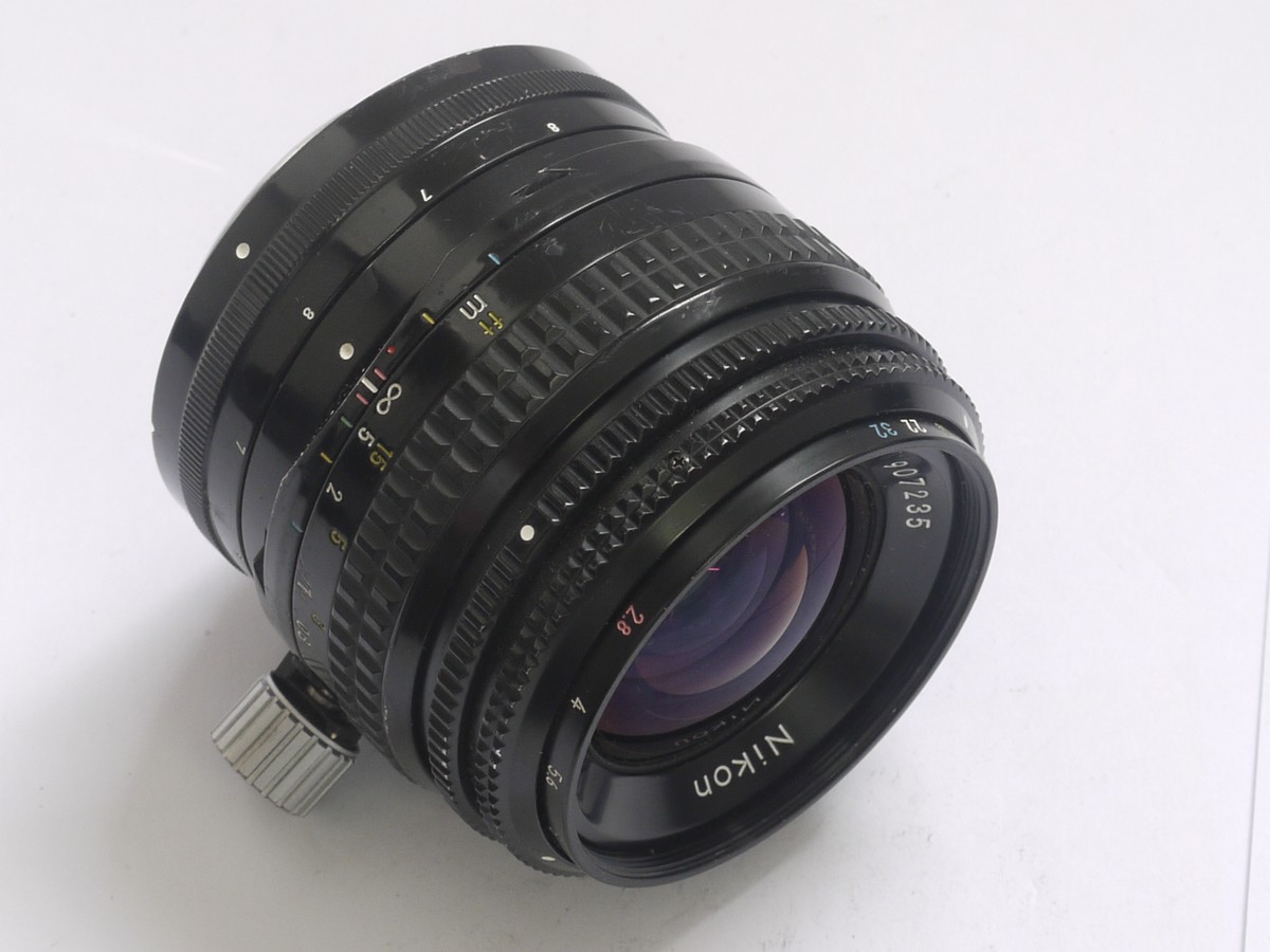 mwclassiccameras-20210409-198 Nikon 35mm f2.8 PC-Nikkor shift lens adapted into A Leica R mount + screw-in lens hood & makers caps