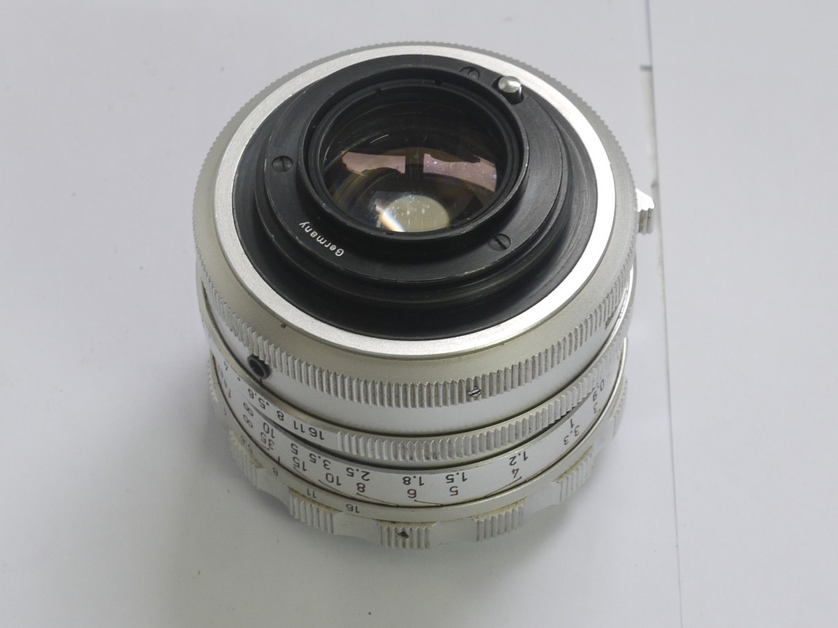 mwclassiccameras-20210409-451 Steinheil 55mm f1.9 Quinon chrome manual focus M42 screw mount lens + makers caps. UNCOMMON