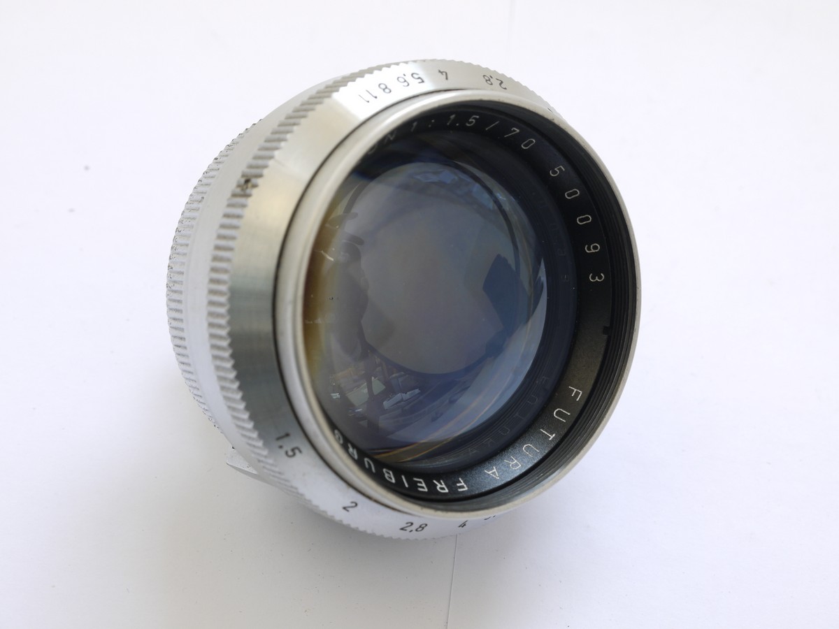 mwclassiccameras-20210423-81 Futura 70mm f1.5 Frilon Fast screw mount Futura lens + Futura 70mm Optical shoe finder, front cap & lens case. VERY RARE