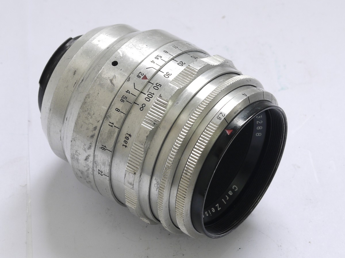 mwclassiccameras-20210430-140 Carl Zeiss Jena 80mm f2.8 Tessar T coated all chrome manual focus Exakta mount lens. Iris has 16 blades