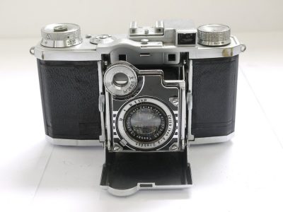 Zeiss Ikon Super Nettel 35mm folding coupled rangefinder camera, chrome, with 5cm f2.8 Tessar lens + makers ER case. UNCOMMON CHROME VERSION