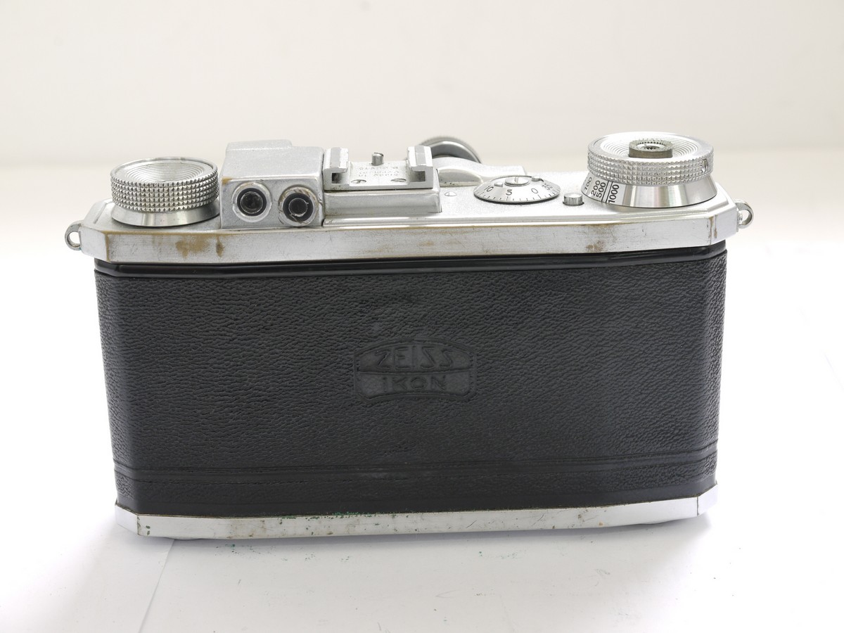 mwclassiccameras-20210430-59 Zeiss Ikon Super Nettel 35mm folding coupled rangefinder camera, chrome, with 5cm f2.8 Tessar lens + makers ER case. UNCOMMON CHROME VERSION