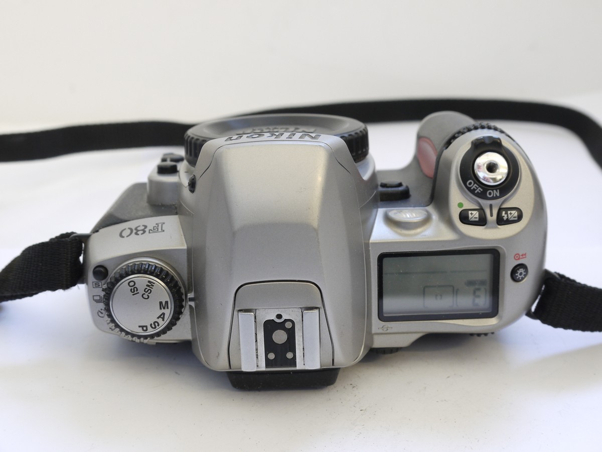 Nikon F80 35mm SLR body, Silver grey finish, with body cap & strap