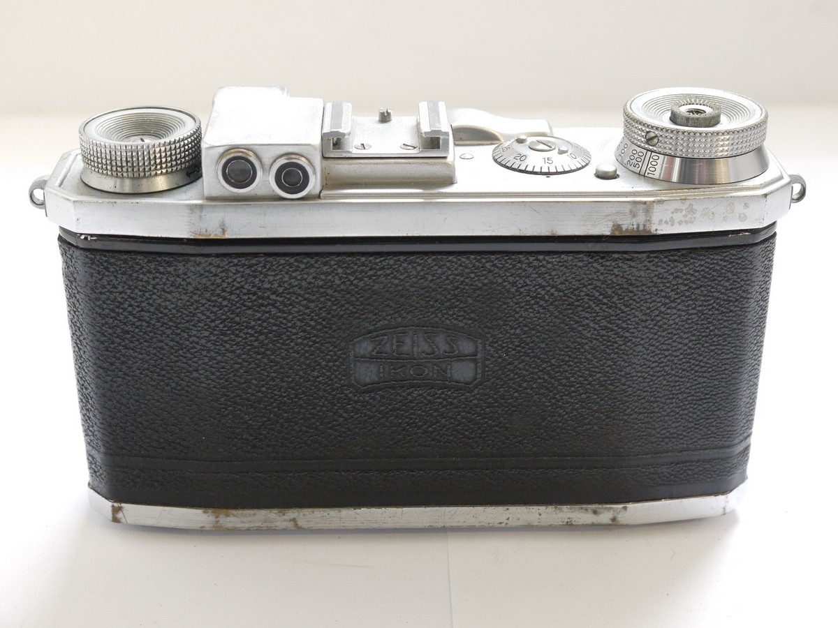 mwclassiccameras-20210513-11 Zeiss Ikon Super Nettel 35mm folding coupled rangefinder camera, chrome, with 5cm f2.8 Tessar lens + makers ER case. UNCOMMON CHROME VERSION