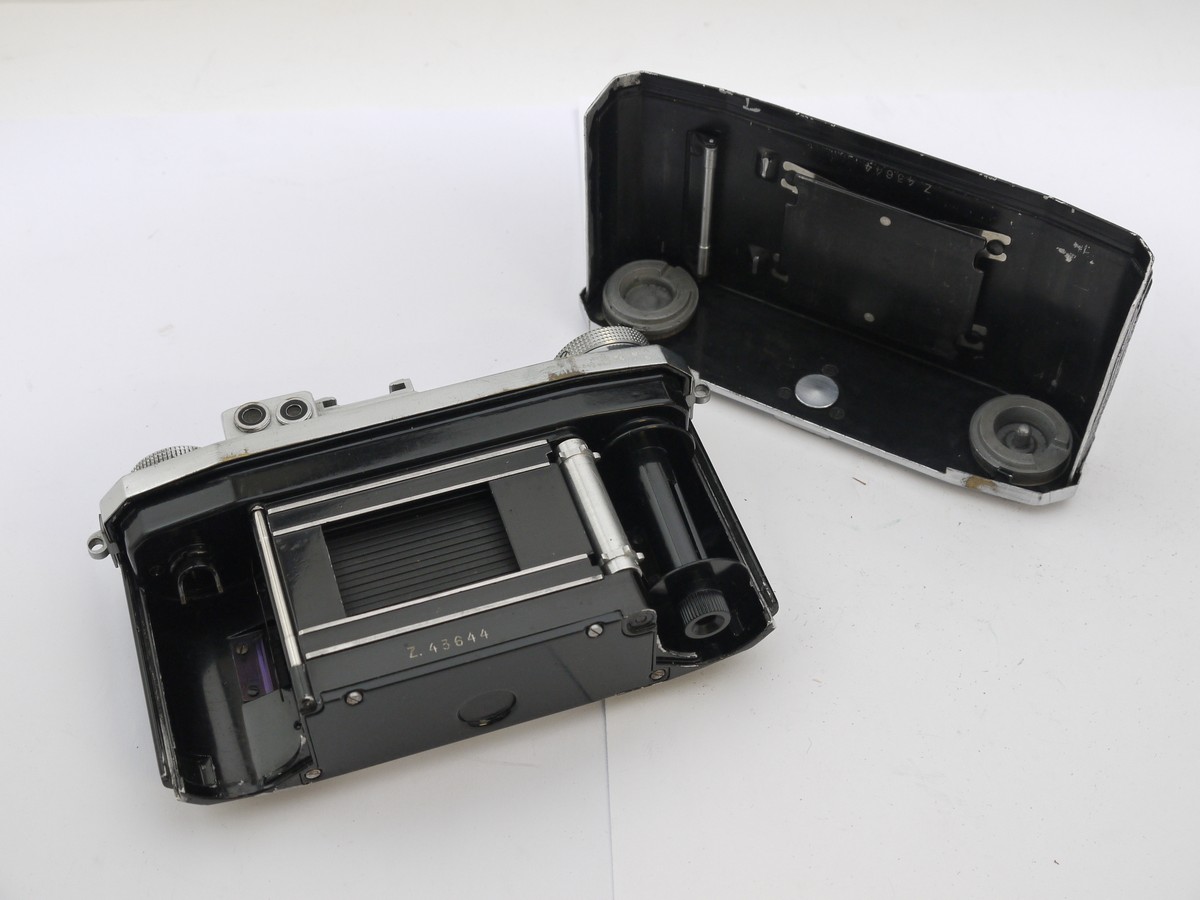 mwclassiccameras-20210513-12 Zeiss Ikon Super Nettel 35mm folding coupled rangefinder camera, chrome, with 5cm f2.8 Tessar lens + makers ER case. UNCOMMON CHROME VERSION