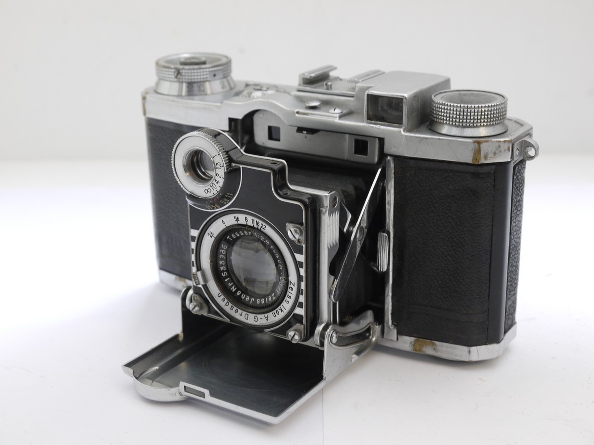 mwclassiccameras-20210513-9 Zeiss Ikon Super Nettel 35mm folding coupled rangefinder camera, chrome, with 5cm f2.8 Tessar lens + makers ER case. UNCOMMON CHROME VERSION