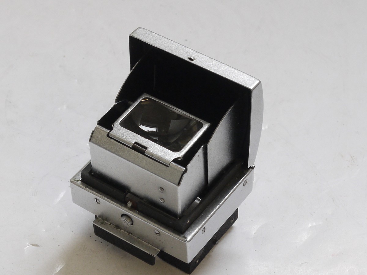 mwclassiccameras-20210521-172 Exakta Waist-level finder, chrome with leatherette covering + brown leather case. No screen