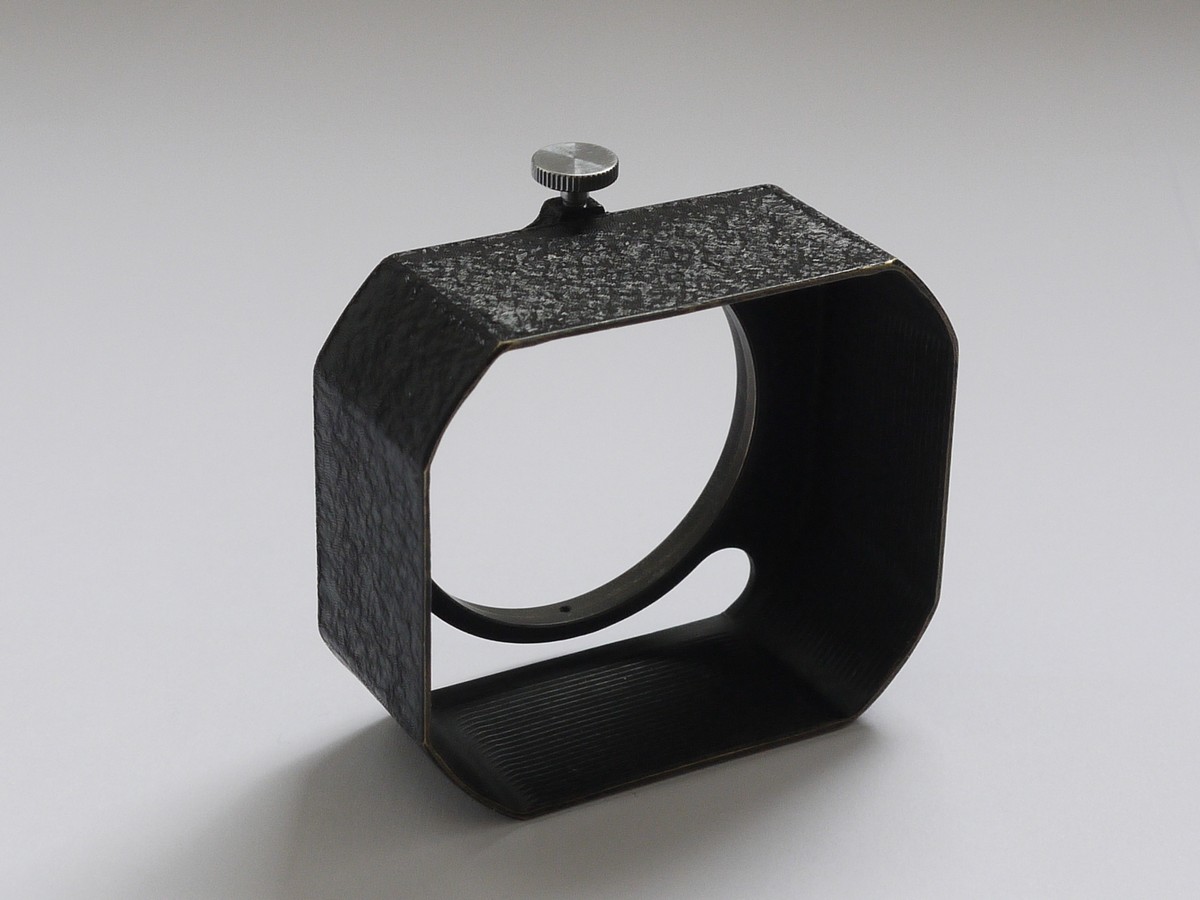 mwclassiccameras-20210604-1 Leitz Push-on square metal lens hood for 50mm f1.5 Summarit/Xenon, with fixing screw