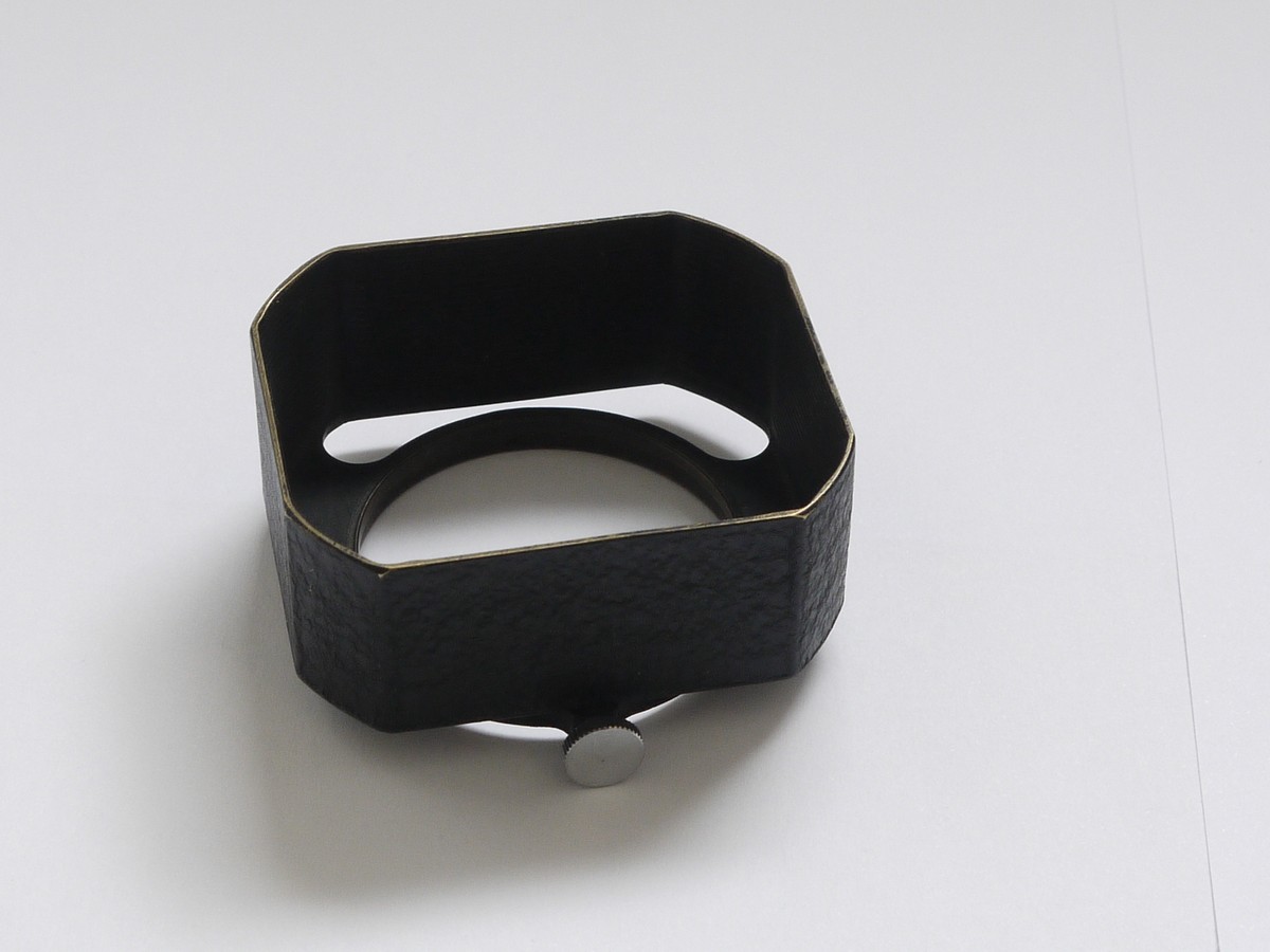mwclassiccameras-20210604-3 Leitz Push-on square metal lens hood for 50mm f1.5 Summarit/Xenon, with fixing screw
