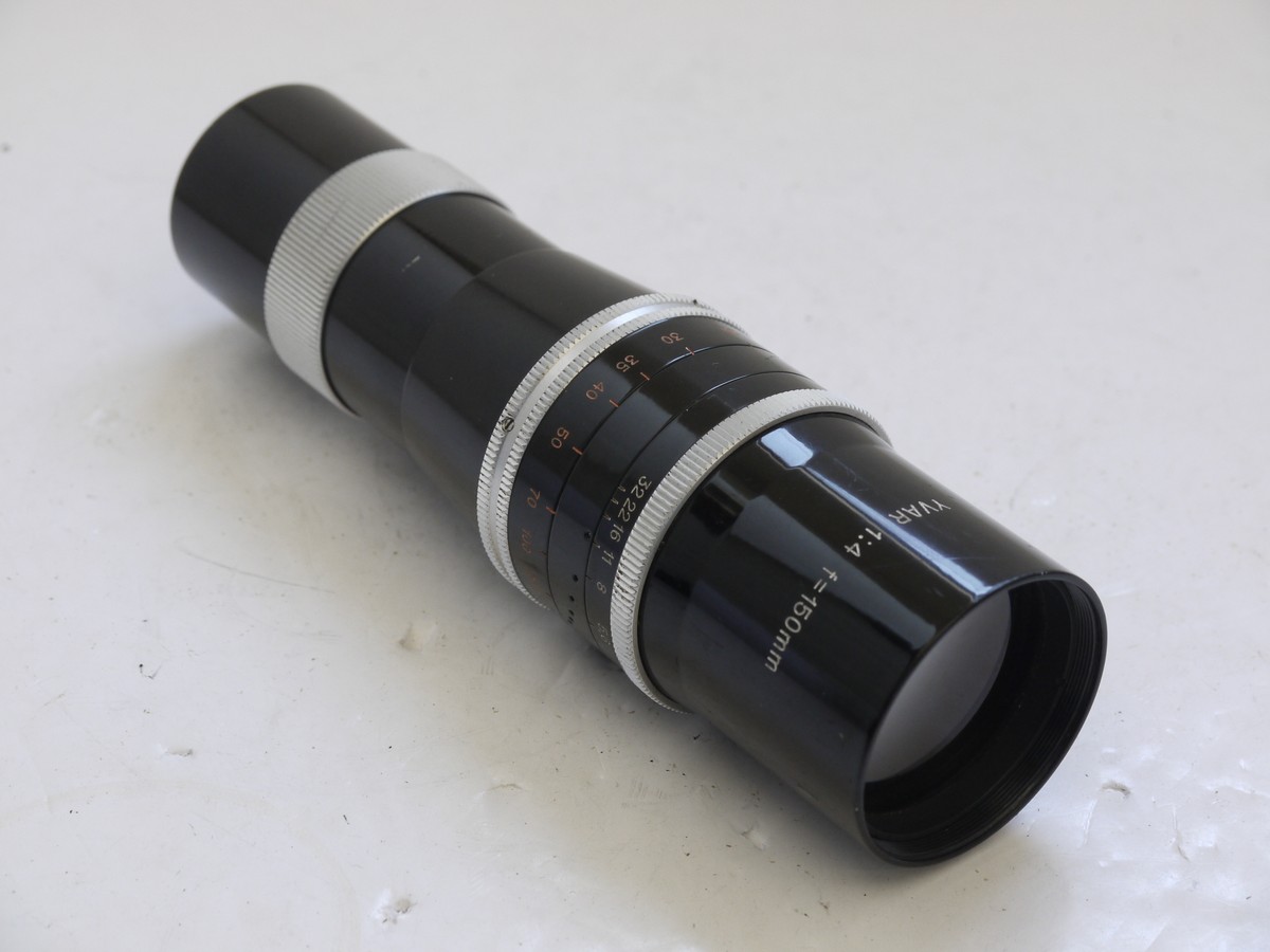 mwclassiccameras-20210716-205 Kern 150mm f4 Yvar lens in 16mm Cine "C" screw mount + makers lens hood, caps & leather case