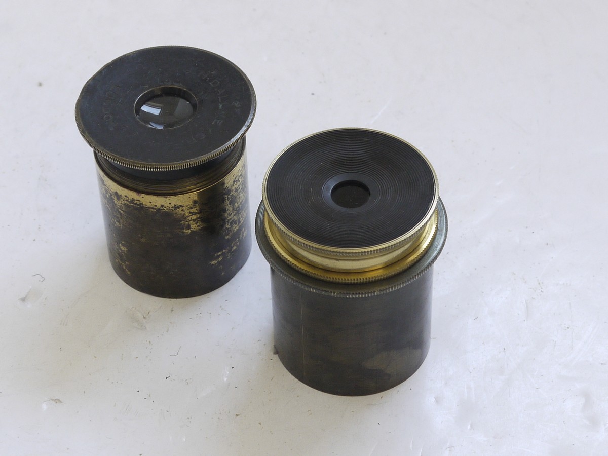 mwclassiccameras-20210716-21 Dallmeyer Optical Lens Device (Scientific use?). Front & Rear parts separate. Red dot visible when shinign a light through