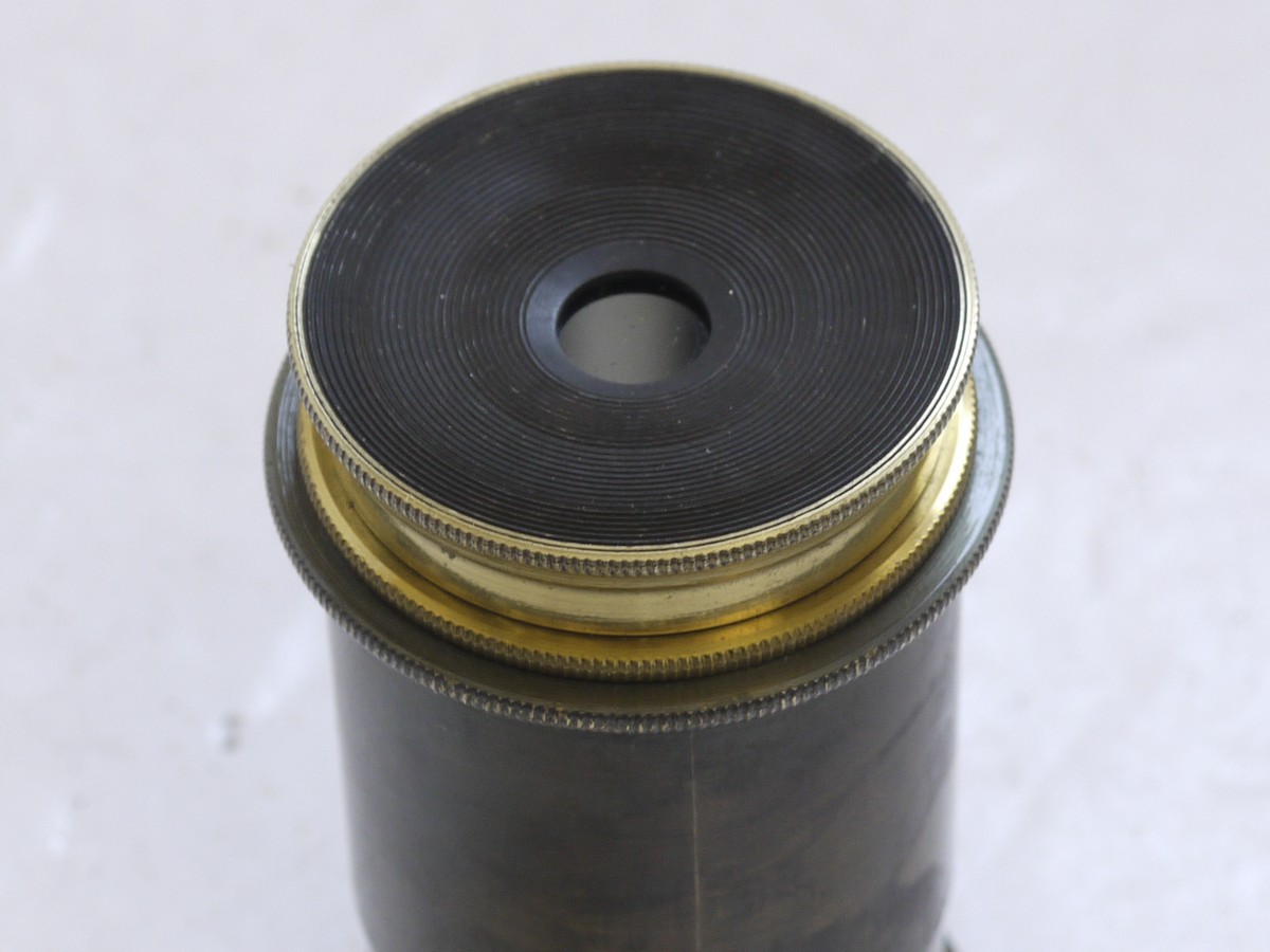 mwclassiccameras-20210716-24 Dallmeyer Optical Lens Device (Scientific use?). Front & Rear parts separate. Red dot visible when shinign a light through