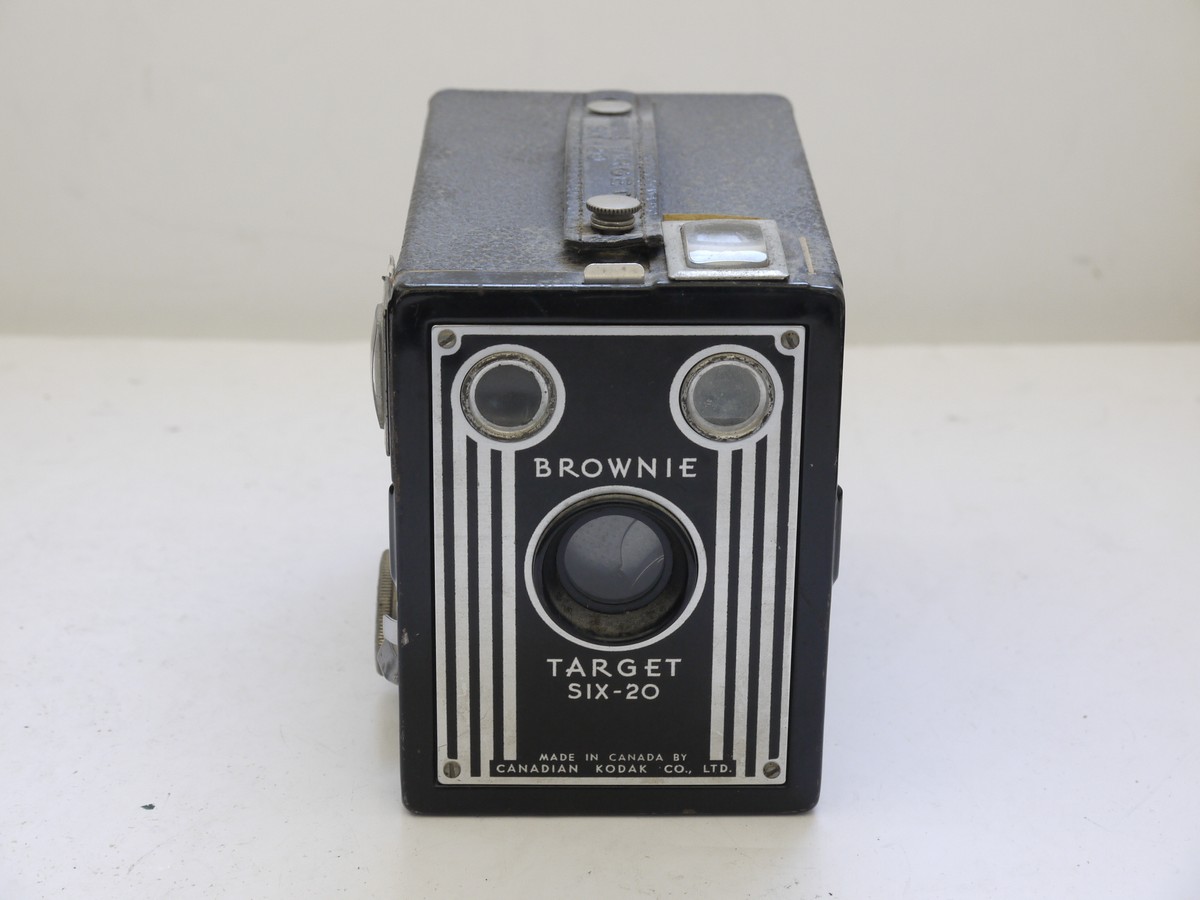 mwclassiccameras-20210716-314 Kodak Brownie Target Six-20 leatherette covered Box camera with metallic Vertcal striped Art-Deco patterned front c1946-52. With handle