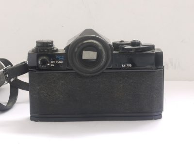 Canon F-1 35mm SLR body with plain. Non-metering prism finder, rubber eyecup & makers neck strap