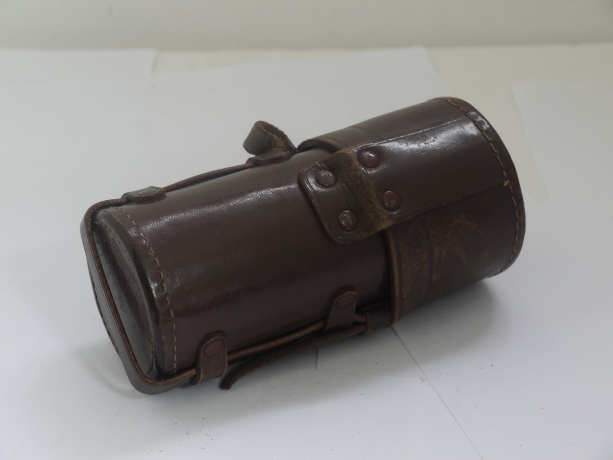 mwclassiccameras-20211008-168 Canon brown leather Rangefinder lens case with strap, with inside lid place for accessory shoe. For telephoto lens