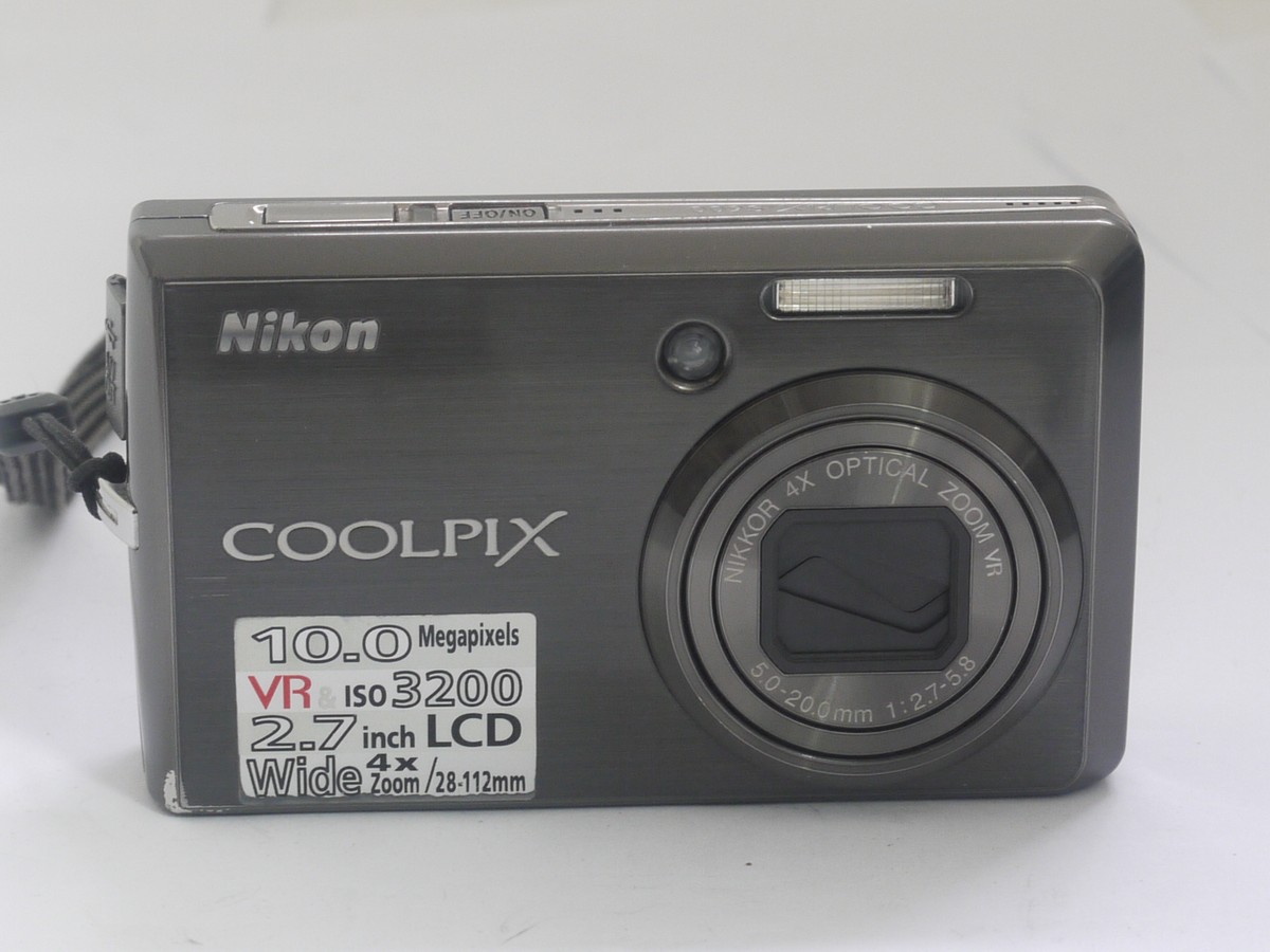 mwclassiccameras-20211008-261 Nikon Coolpix S600 10MP digital Compact camera with wrist strap, pouch case, 2 x batteries, charger, leads, CD ROM, instructions & box with packaging