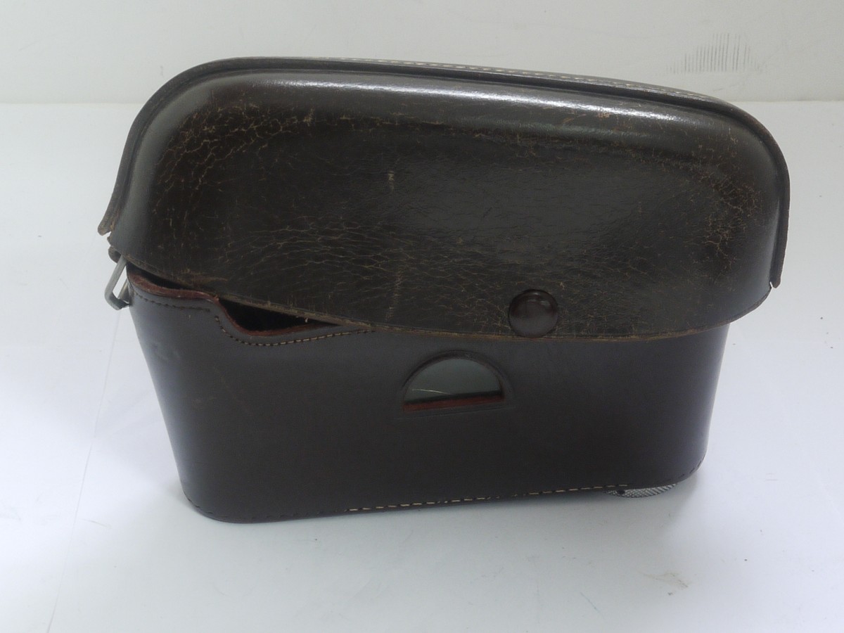 mwclassiccameras-20211008-87 Leitz brown leather ER case with strap for the M3 with long nose front & small triod screw. Early type with single button fastening