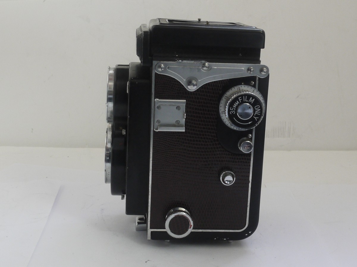 mwclassiccameras-20211015-178 Yashica 635 6x6 120 TLR with Reskinned Faux Reptile purple covering, with 80mm f3.5 Yashikor lens in Copal MXV shutter + front cap. NON-WORKING SHUTTER