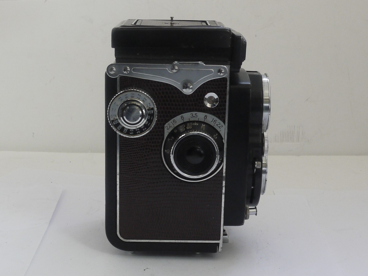 mwclassiccameras-20211015-180 Yashica 635 6x6 120 TLR with Reskinned Faux Reptile purple covering, with 80mm f3.5 Yashikor lens in Copal MXV shutter + front cap. NON-WORKING SHUTTER