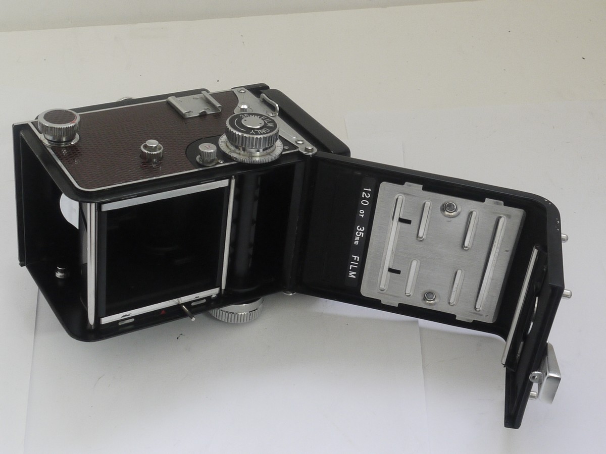 mwclassiccameras-20211015-183 Yashica 635 6x6 120 TLR with Reskinned Faux Reptile purple covering, with 80mm f3.5 Yashikor lens in Copal MXV shutter + front cap. NON-WORKING SHUTTER