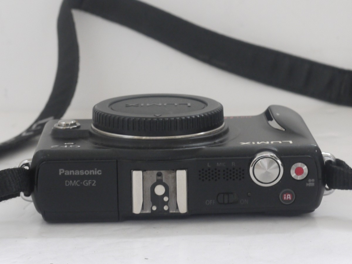 mwclassiccameras-20211029-44 Panasonic Lumix DMC-GF2 12.1MP Digital camera body, black, with body cap, Panasonic DMW-BLB10E Battery, DE-A94 charger & Lumix neck strap