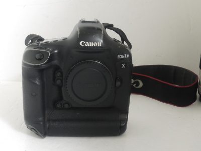 Canon EOS-1 DX 18.1 MP DSLR body + LP-E4N Battery Pack, Canon Neck strap & makers Box. Shutter count is 360000