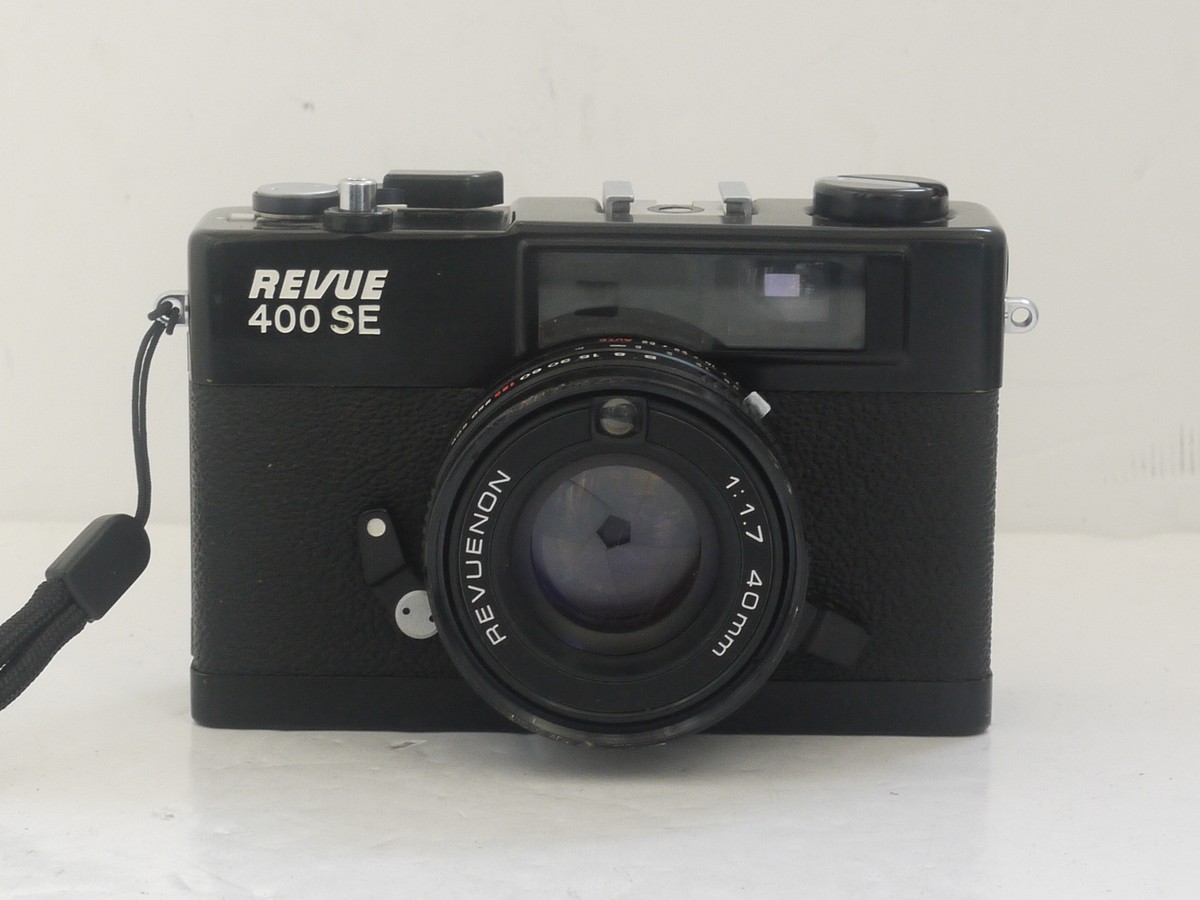 mwclassiccameras-20211112-32 Revue 400 SE 35mm CDS metered coupled rangefinder camera, black, with 40mm f1.7 Revuenon lens, with wrist strap. QUALITY COMPACT WITH GOOD LENS