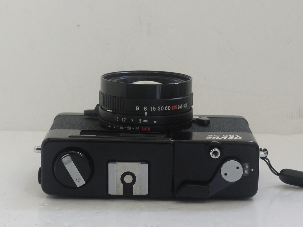 mwclassiccameras-20211112-34 Revue 400 SE 35mm CDS metered coupled rangefinder camera, black, with 40mm f1.7 Revuenon lens, with wrist strap. QUALITY COMPACT WITH GOOD LENS
