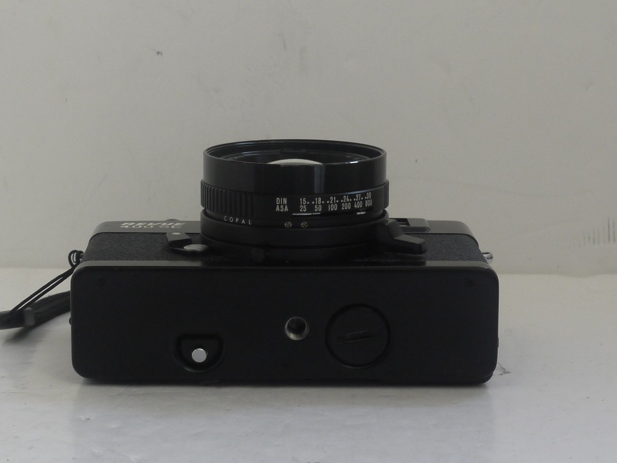 mwclassiccameras-20211112-35 Revue 400 SE 35mm CDS metered coupled rangefinder camera, black, with 40mm f1.7 Revuenon lens, with wrist strap. QUALITY COMPACT WITH GOOD LENS