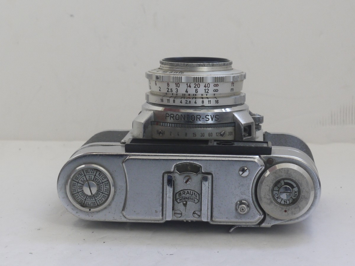 mwclassiccameras-20211112-78 Braun Paxette 35mm coupled rangefinder camera with three built-in frame finders + Steinheil 50mm f2.8 Cassarit E, Staeble 45mm f2.8 Kata & Staeble 135mm f3.8 Telenon L39 screw mount lenses, Braun Universal shoe finder, Various size/types filters & makers outfit case