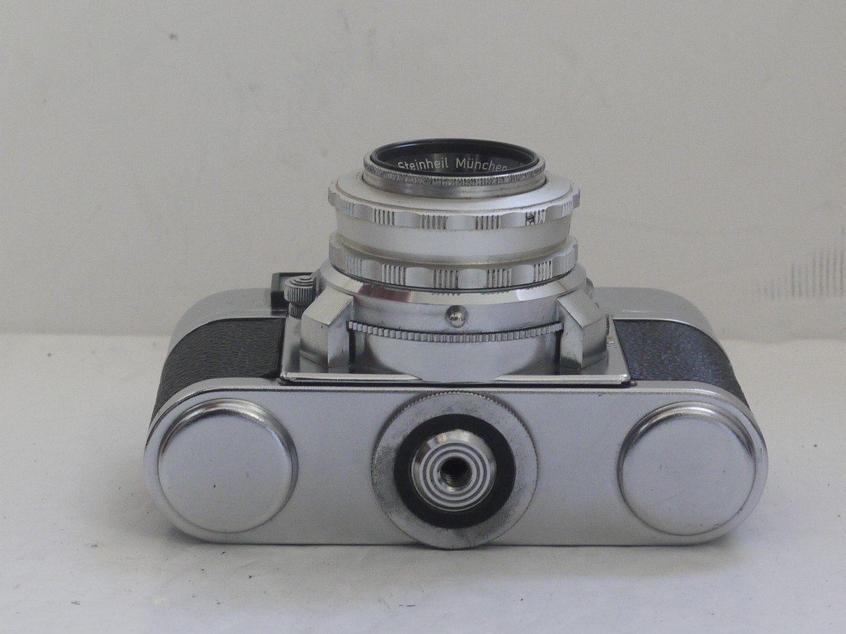 mwclassiccameras-20211112-79 Braun Paxette 35mm coupled rangefinder camera with three built-in frame finders + Steinheil 50mm f2.8 Cassarit E, Staeble 45mm f2.8 Kata & Staeble 135mm f3.8 Telenon L39 screw mount lenses, Braun Universal shoe finder, Various size/types filters & makers outfit case