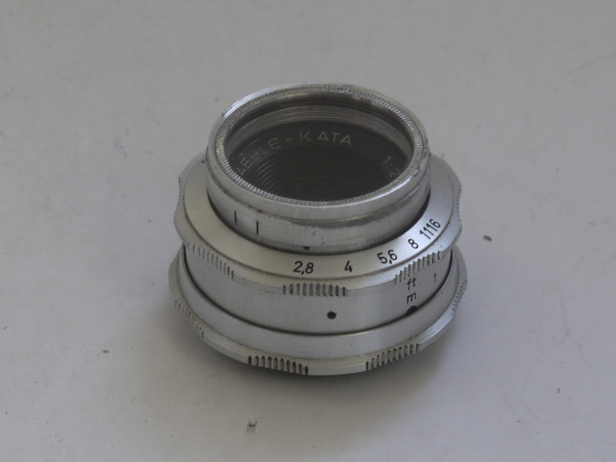 mwclassiccameras-20211112-85 Braun Paxette 35mm coupled rangefinder camera with three built-in frame finders + Steinheil 50mm f2.8 Cassarit E, Staeble 45mm f2.8 Kata & Staeble 135mm f3.8 Telenon L39 screw mount lenses, Braun Universal shoe finder, Various size/types filters & makers outfit case