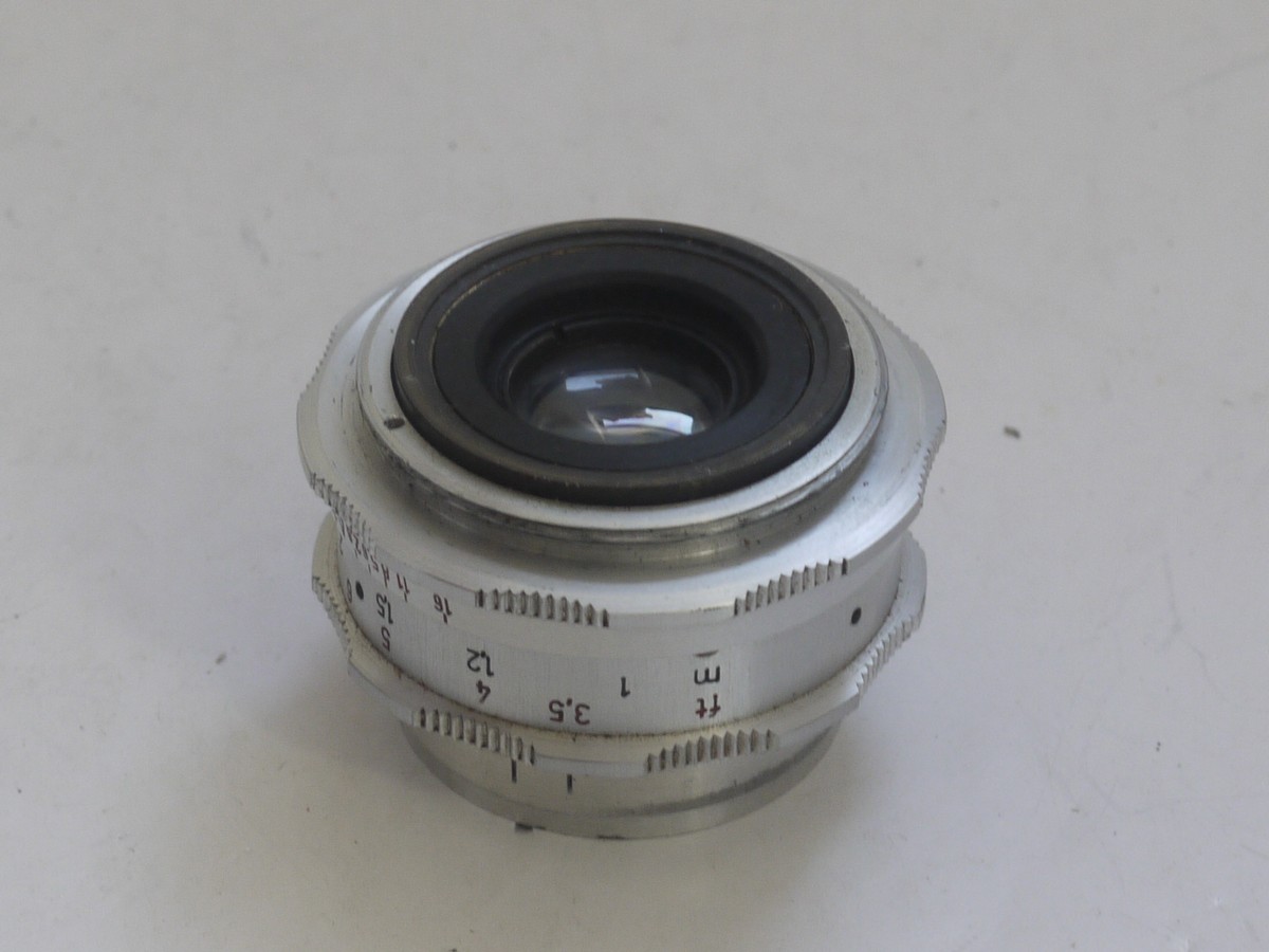 mwclassiccameras-20211112-86 Braun Paxette 35mm coupled rangefinder camera with three built-in frame finders + Steinheil 50mm f2.8 Cassarit E, Staeble 45mm f2.8 Kata & Staeble 135mm f3.8 Telenon L39 screw mount lenses, Braun Universal shoe finder, Various size/types filters & makers outfit case