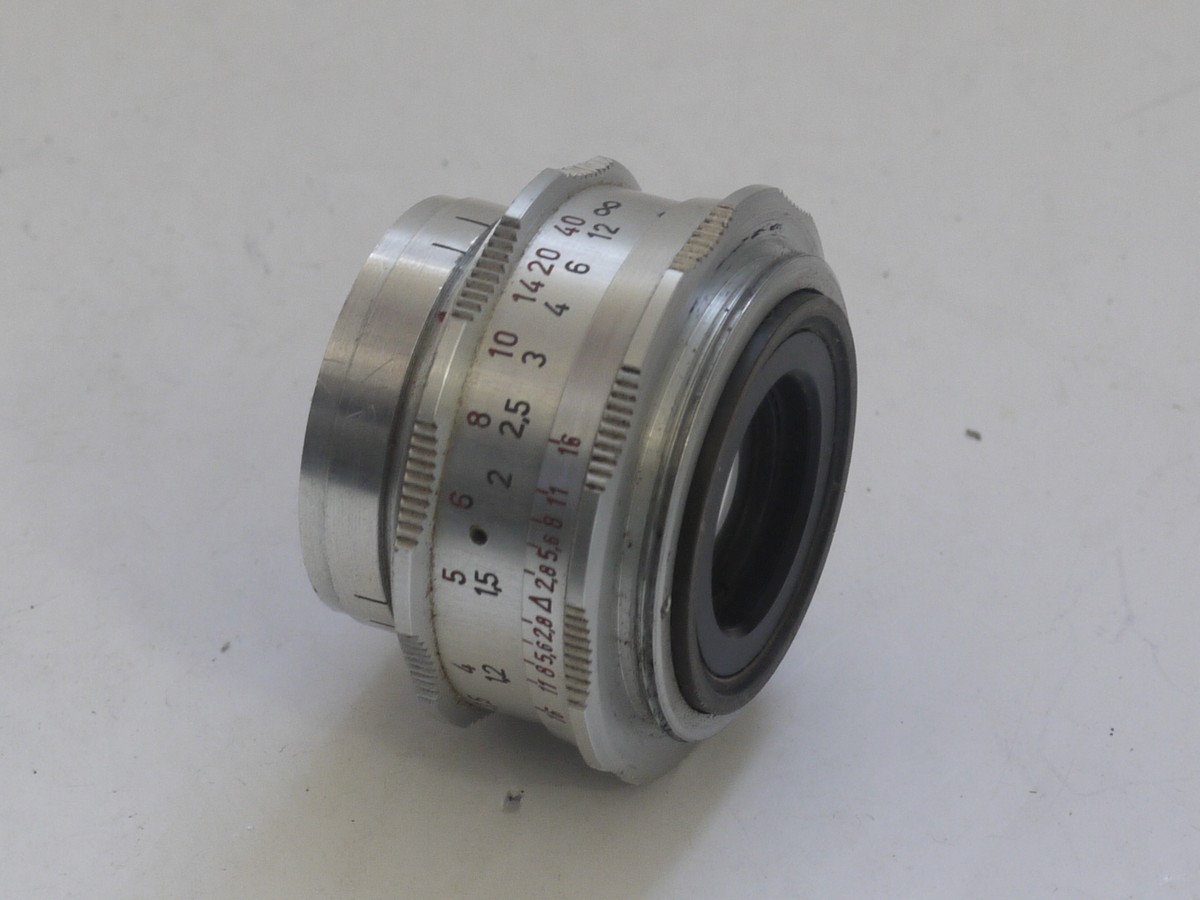 mwclassiccameras-20211112-88 Braun Paxette 35mm coupled rangefinder camera with three built-in frame finders + Steinheil 50mm f2.8 Cassarit E, Staeble 45mm f2.8 Kata & Staeble 135mm f3.8 Telenon L39 screw mount lenses, Braun Universal shoe finder, Various size/types filters & makers outfit case