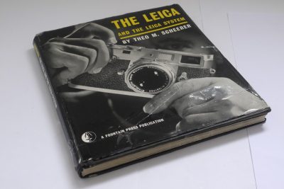 The Leica and the Leica System book by Theo M Scheerer. Hardbound, with dust cover. 184 pages in English