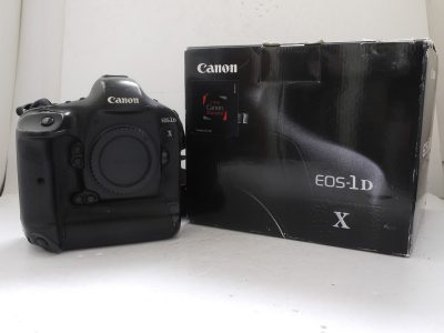 Canon EOS-1 DX 18.1 MP DSLR body + LP-E4N Battery Pack, Canon Neck strap & makers Box. Shutter count is 360000