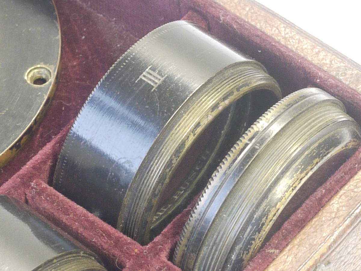 mwclassiccameras-20211224-74 Busch's Unicum-Aplanatsatz set of Five lenses, inscribed Rathenow II & III, and HII, HIII, with one smaller unmarked lens. All in makers presentation box