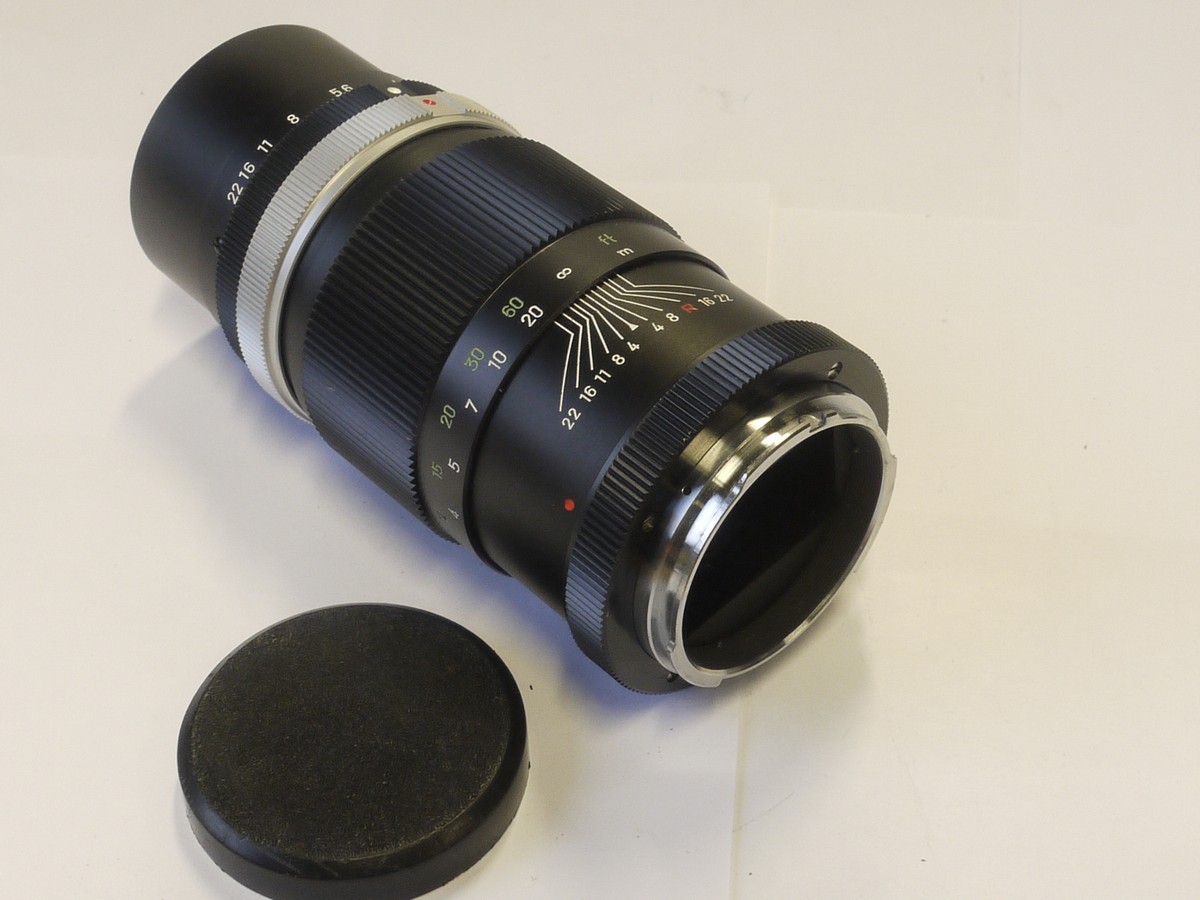 mwclassiccameras-20220107-91 Minolta 135mm f4 Rokkor-TC Early type Pre-set bayonet mount lens + makers caps
