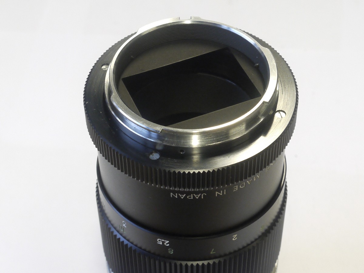 mwclassiccameras-20220107-93 Minolta 135mm f4 Rokkor-TC Early type Pre-set bayonet mount lens + makers caps