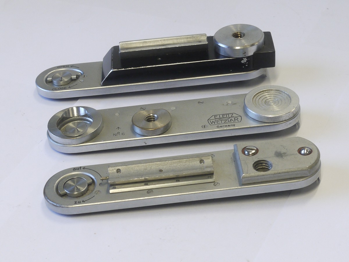 mwclassiccameras-20220114-198 Leitz set of Three Specialist L39 camera baseplates (Two with flash holder rails & one other