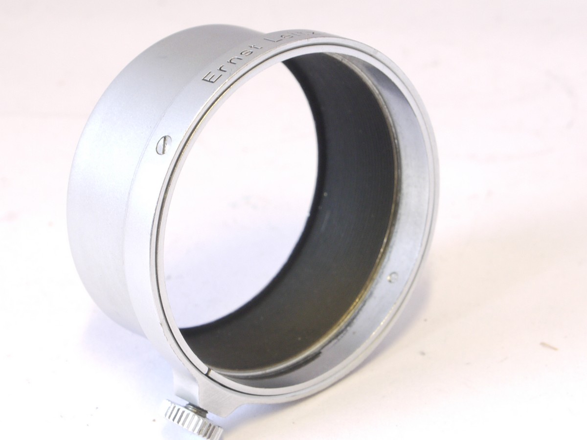 mwclassiccameras-20220408-399 Leitz A36 push-on chrome lens hood, FISON, with fixing screw, for 5cm f3.5 Elmar lens