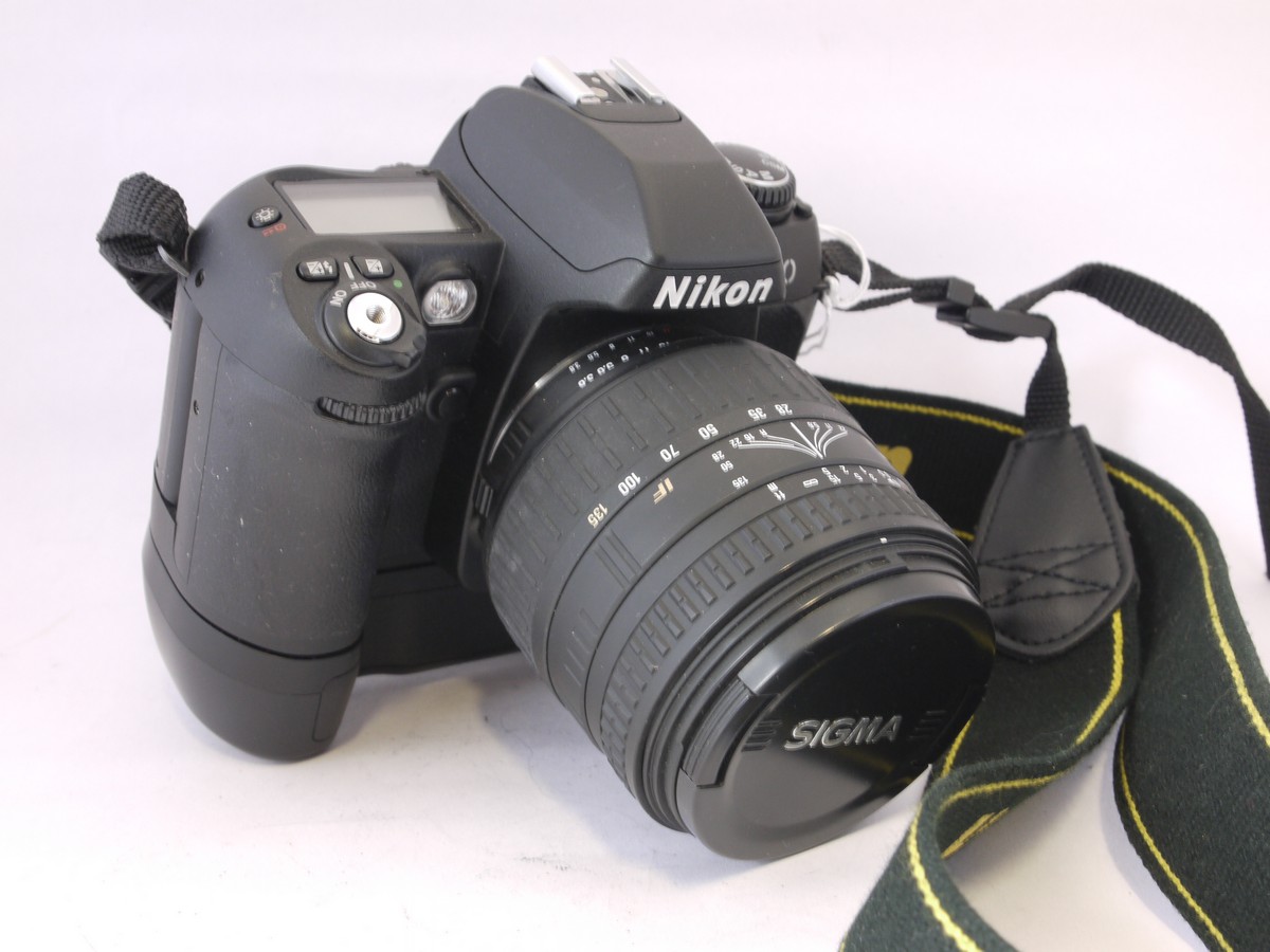 mwclassiccameras-20220415-288 Nikon F80 35mm AF SLR with MB-16 Battery pack + Sigma 28-135mm f3.8-5.6 Aspherical lens & Nikon neck strap