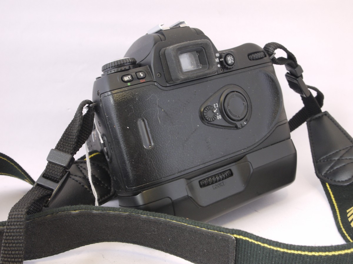 mwclassiccameras-20220415-289 Nikon F80 35mm AF SLR with MB-16 Battery pack + Sigma 28-135mm f3.8-5.6 Aspherical lens & Nikon neck strap