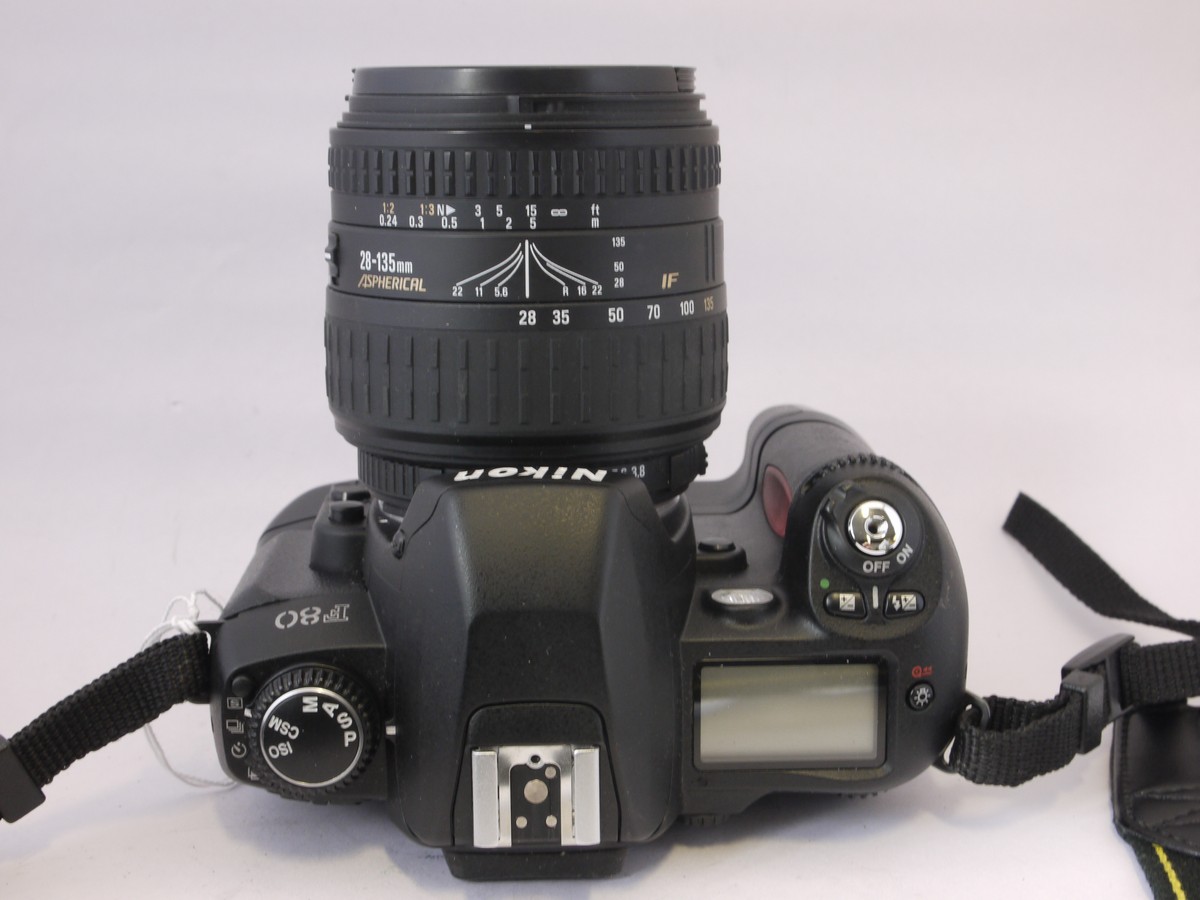 mwclassiccameras-20220415-290 Nikon F80 35mm AF SLR with MB-16 Battery pack + Sigma 28-135mm f3.8-5.6 Aspherical lens & Nikon neck strap